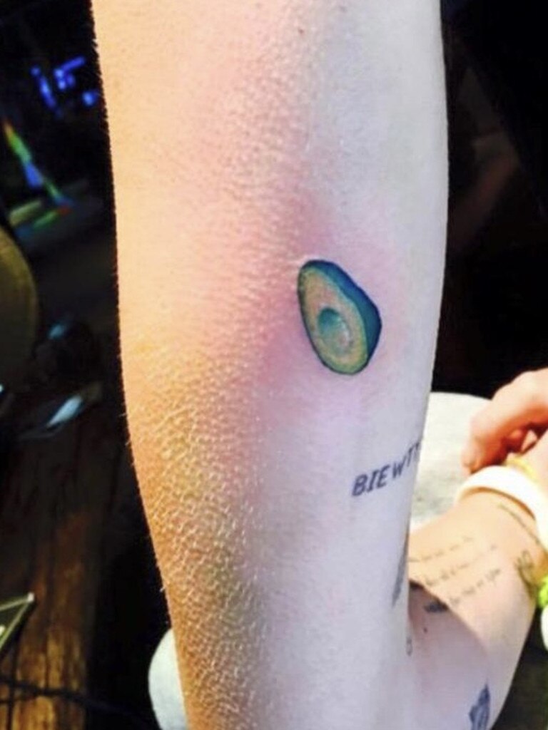 Miley Cyrus’ tiny avocado tattoo.