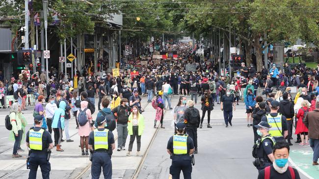 Invasion Day Rally through the streets of Melbourne on Australia Day. Picture: Alex Coppel.