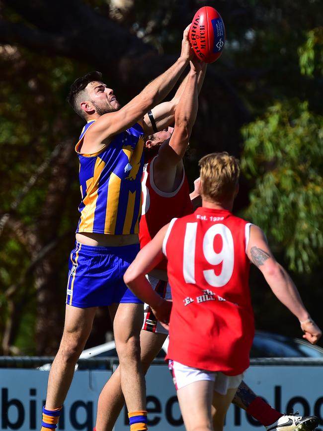 Somerville full-forward Tom Shaw attempts a mark against Red Hill. Picture: Derrick den Hollander