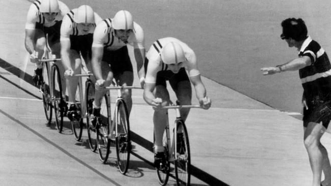 Cycling coach Charlie Walsh urging on Australian pursuit team Mike Turtur, Mike Grenda, Dean Woods and Kevin Nichols during the 1984 Olympics.