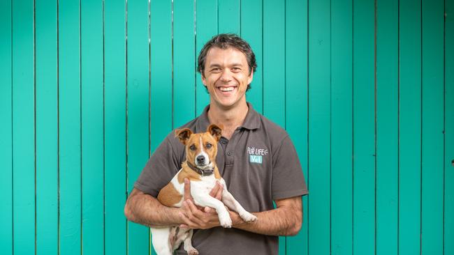 Vet at Apiam Animal Health's Fur Life Vet Clinic in Highton George Johnstone with Jack Russell Astro is predicting a spike of presentations this year as the first summer in years without any COVID restrictions. Picture: Brad Fleet