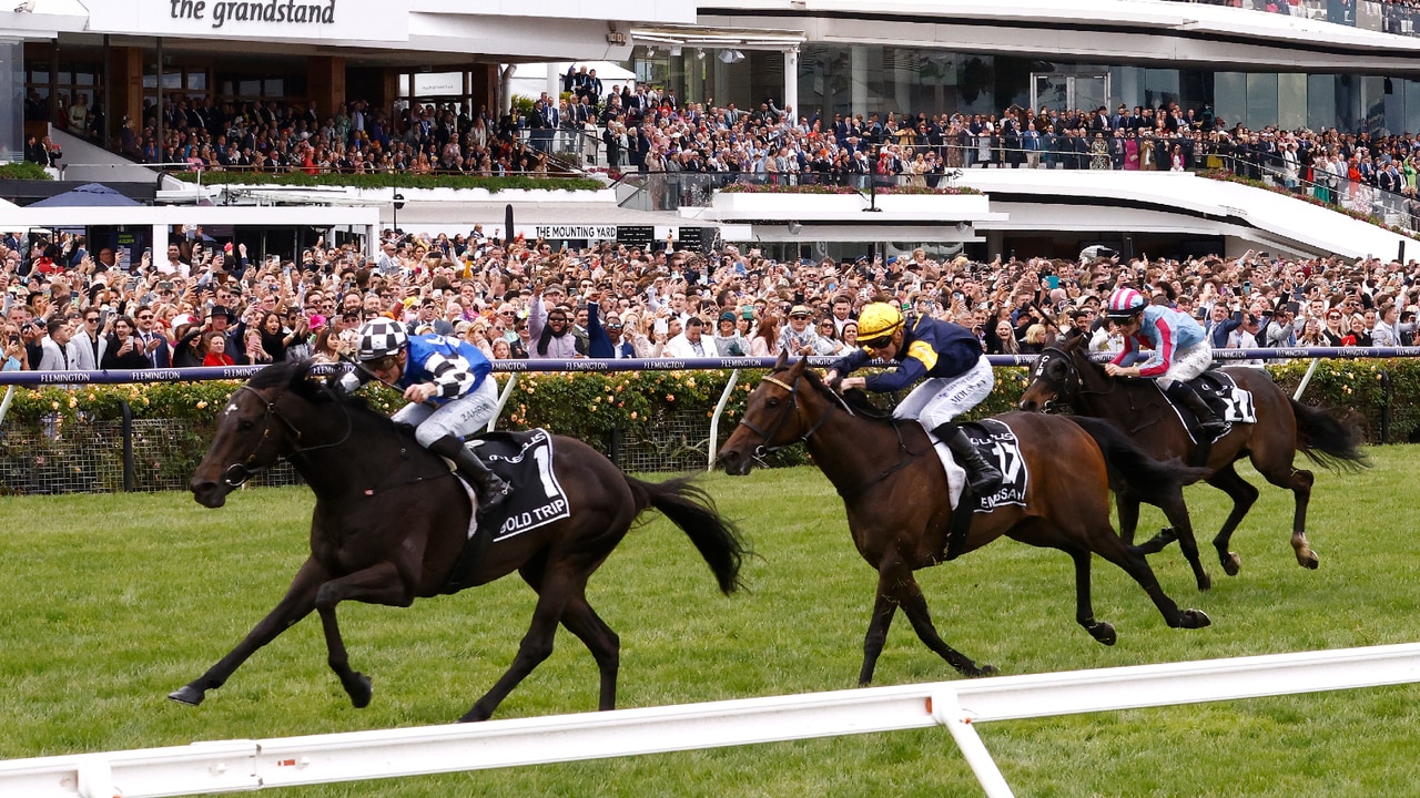 Massive crowds enter Flemington as the Melbourne Cup prepares to kick