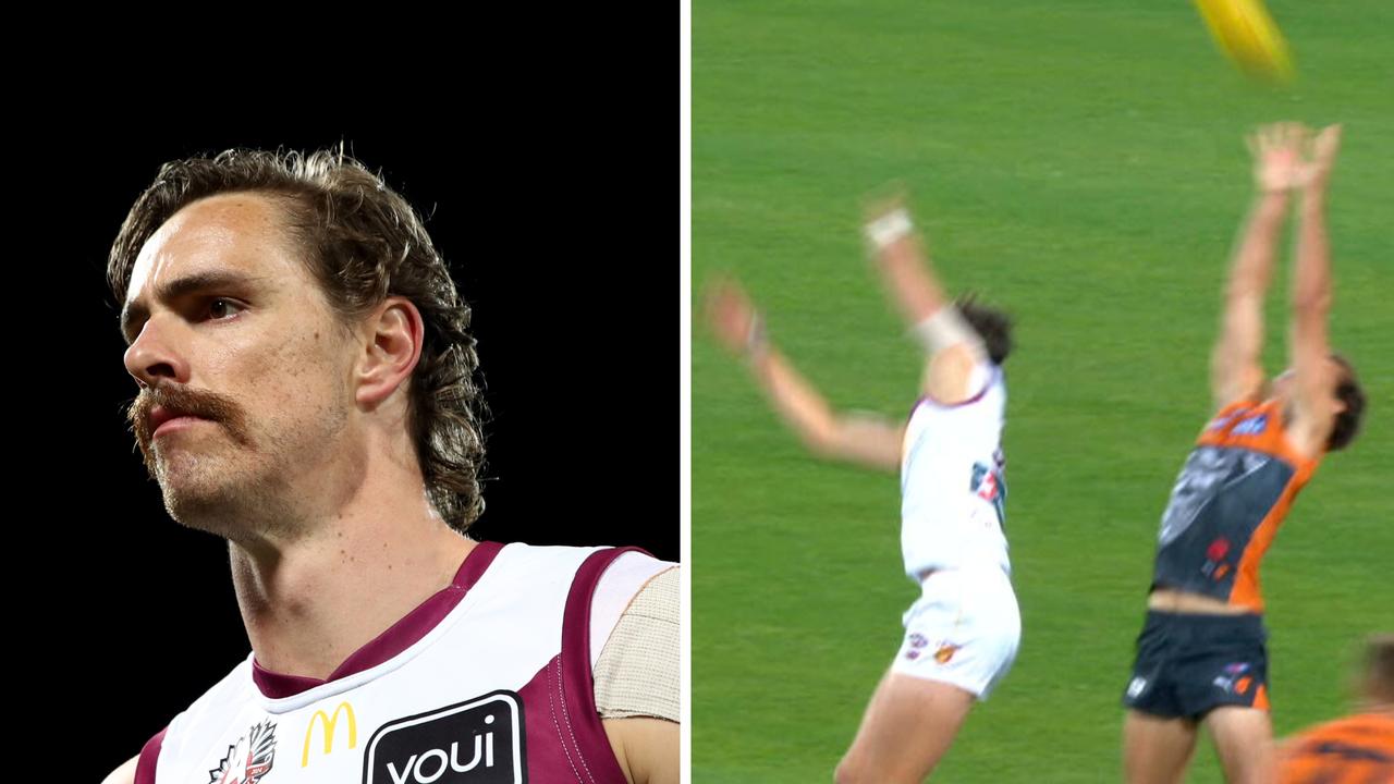 Joe Daniher / and getting outmarked by Jack Buckley.