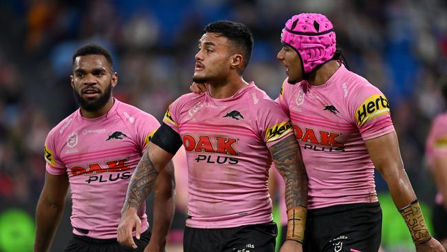 Teammates had to escort Spencer Leniu to the sideline, after being sin-binned. Picture: NRL Imagery.