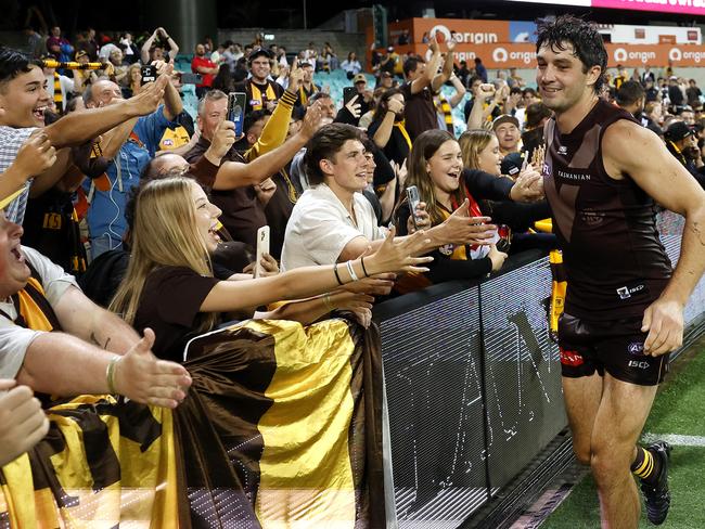 Tom Barrass celebrates with fans. Picture: Phil Hillyard.