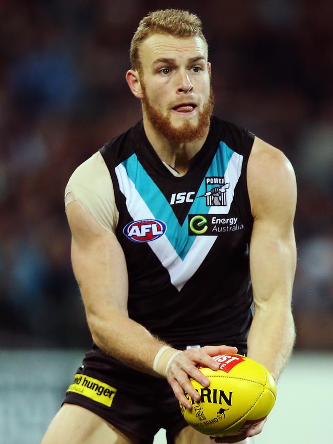 Andrew Moore in action for Port Adelaide during the 2014 AFL season. Picture: Morne de Klerk/Getty Images