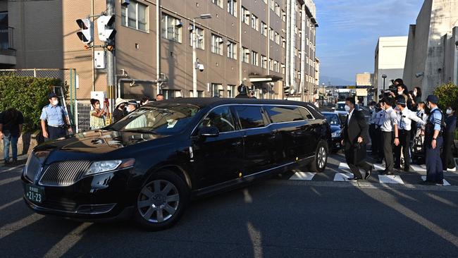 A hearse carrying the body of Shinzo Abe leaves the Nara Medical University Hospital in Kashihara on Saturday. Picture: AFP