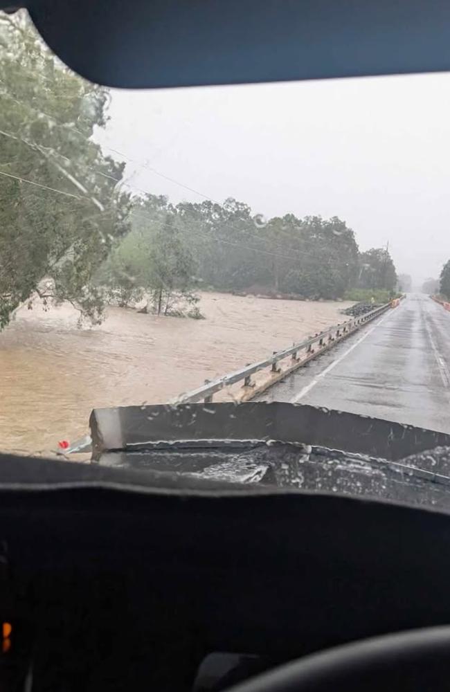 Floodwater rising at the newly repaired Ollera Creek Bridge on the Bruce Highway between Townsville and Ingham on Tuesday. Picture: Supplied