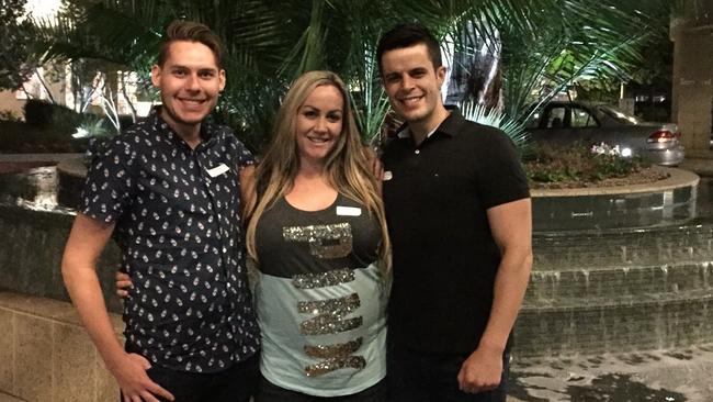 Chris Inzitari and Sean Wheatley with surrogate mother Ashley Brown, who is pregnant with their twins