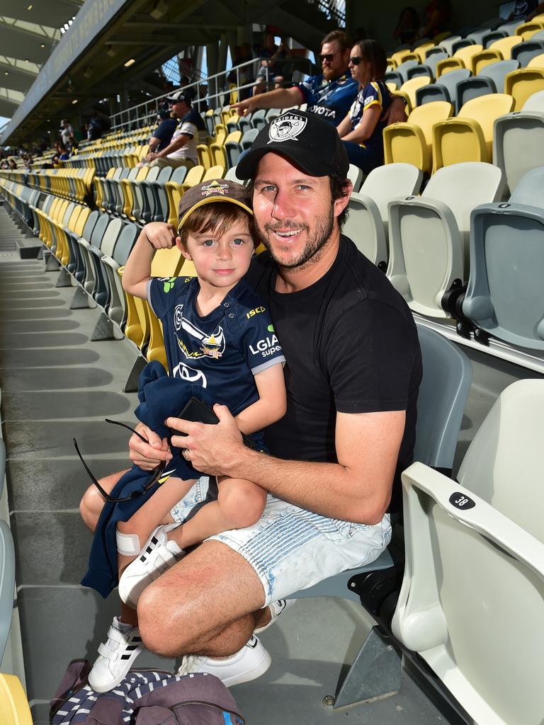 North Queensland Cowboys against Newcastle Knights at Queensland Country Bank Stadium. Daniel Smith with Lachlan, 5. Picture: Evan Morgan