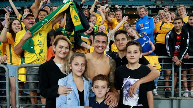 Tim Cahill pictured with his family after his final appearance for Australia in 2018. Picture: Toby Zerna