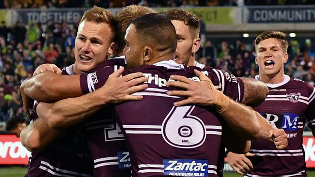 Daly Cherry-Evans celebrates with Manly Sea Eagles teammates after the win over Canberra. Picture: AAP