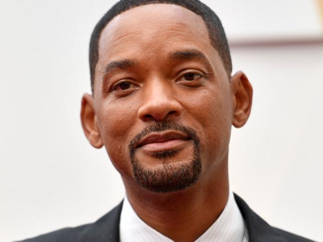 In this file photo taken on March 27, 2022 US actor Will Smith attends the 94th Oscars at the Dolby Theatre in Hollywood, California. - Will Smith has posted an emotional new apology for slapping Chris Rock at the Oscars earlier this year, revealing in a lengthy video clip, posted to social media on July 29, 2022, that he has reached out to the comedian who was not yet "ready to talk." "Chris, I apologize to you. My behavior was unacceptable. And I'm here, whenever you're ready to talk," Smith reiterated said in the nearly six-minute video, in which he also answered fans' questions about the shocking moment that has tarnished his public image. (Photo by ANGELA WEISS / AFP)