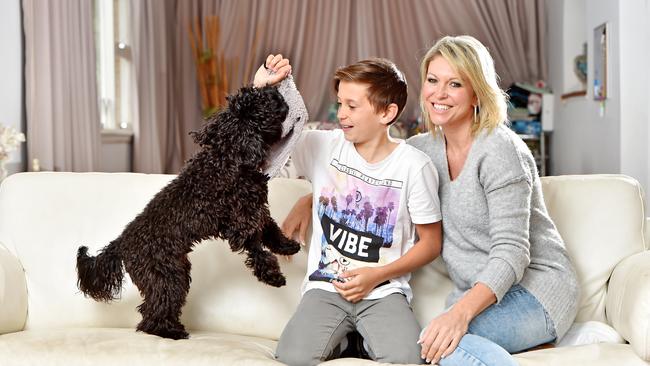 Rozz Switzer &amp; son Hudson, 11, with Bullet. Picture: (AAP IMAGE / Troy Snook)