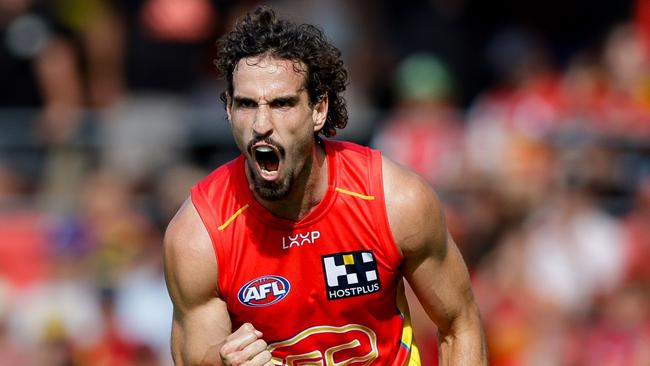 GOLD COAST, AUSTRALIA - MARCH 09: Ben King of the Suns celebrates a goal during the 2024 AFL Opening Round match between the Gold Coast SUNS and the Richmond Tigers at People First Stadium on March 09, 2024 in Gold Coast, Australia. (Photo by Russell Freeman/AFL Photos via Getty Images)