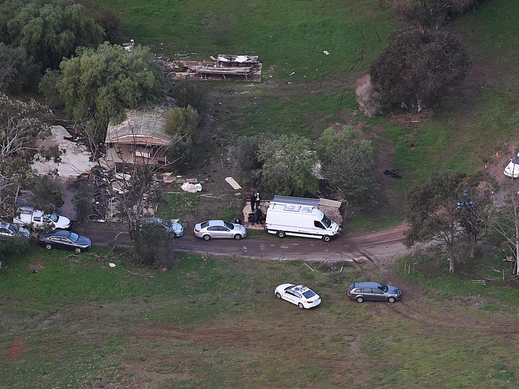 Police at the house in Hillier, in Adelaide’s north, on the day the three bodies were found. Picture: Sam Wundke/Nine News helicopter