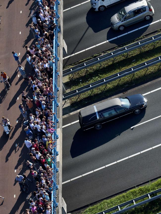 Crowds flock to see the convoy. Picture: AFP Photo/ANP/Jerry Lampen