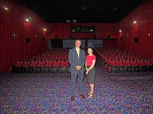 UNIQUE OPPORTUNITY: Ray White agents Richard Murray and Louisa Blennerhassett inside the Sovereign Cinema building, part of which goes under the hammer on Monday. Picture: Troy Jegers