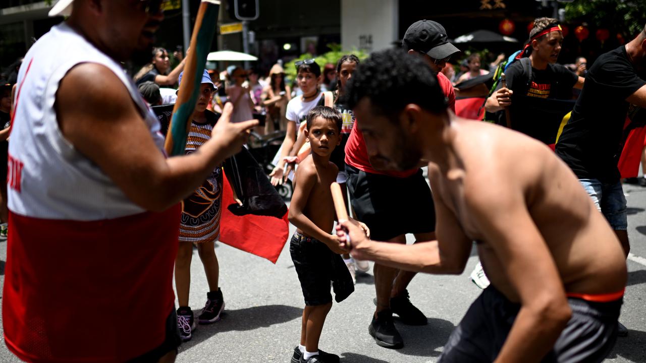 Protesters take part in an Invasion Day rally and march in Brisbane, coinciding with Australia Day. Picture: NCA Newswire / Dan Peled