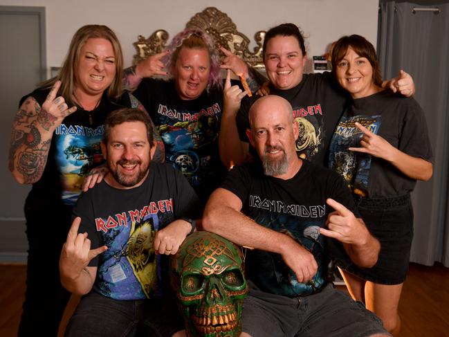 Chris Irvine and Arik Anidjar (front) with Trish Irvine, Rebekah Bennett, Kylie Berry-Porter and Jess Gorman are part of the FB group Bring Iron Maiden To Townsville. Picture: Evan Morgan