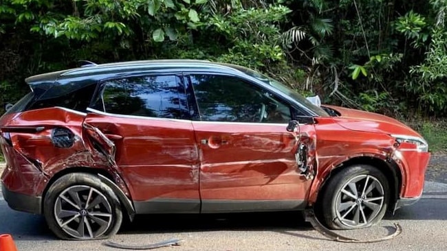 A car showing significant damage to side panels. Supplied