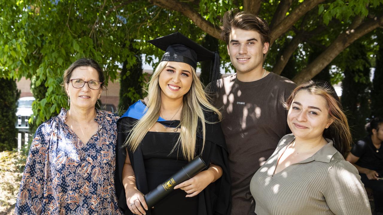 Bachelor of Science graduate Elise Odner with (from left) Kaye Odner, Jack Rawlings and Aleisha Cheihk at the UniSQ graduation ceremony at Empire Theatres, Wednesday, December 14, 2022.