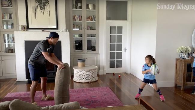 Karmichael Hunt runs some drills in the family home.