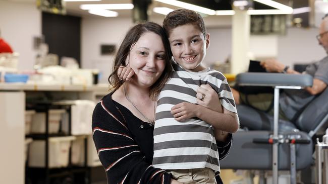 Riley Phillips, 9, with mother Britney Chiron-Ball. Picture: Josh Woning