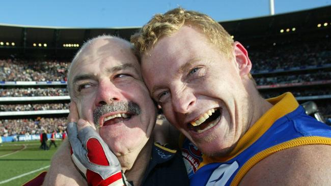 Leigh Matthews and Michael Voss embrace after Brisbane Lions’ 2003 Grand Final win.