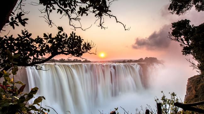 Victoria Falls at sunrise.