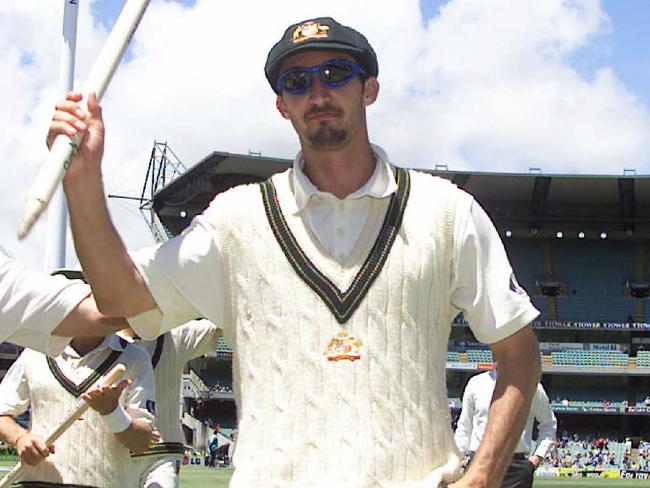 Cricketer Jason Gillespie carrying wicket after winning. Cricket - Australia vs West Indies day four of Fourth Test match at MCG 29 Dec 2000. a/ct