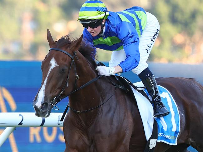 SYDNEY, AUSTRALIA - MARCH 30: Jamie Kah riding Another Wil wins Race 9 Racing And Sports Doncaster Prelude during "Stakes Day" - Sydney Racing at Rosehill Gardens on March 30, 2024 in Sydney, Australia. (Photo by Jeremy Ng/Getty Images)