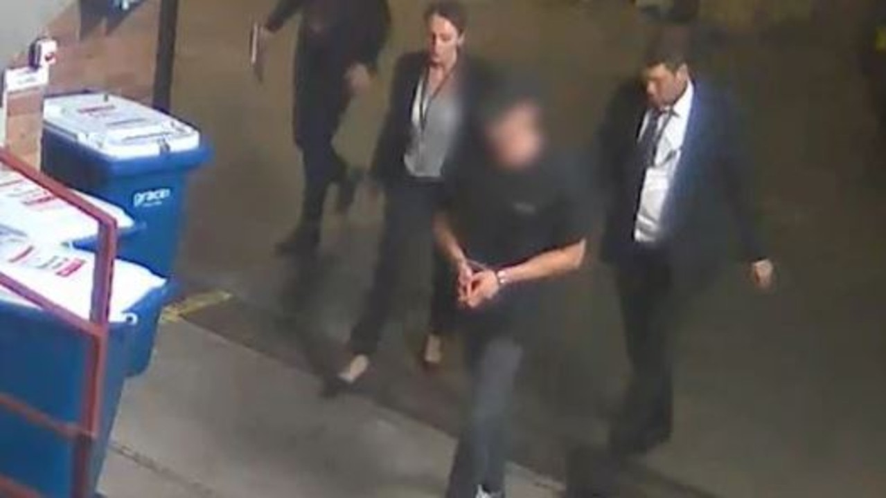 Beau Lamarre-Condon being arrested after handing himself in on Friday. Picture: NSW Police