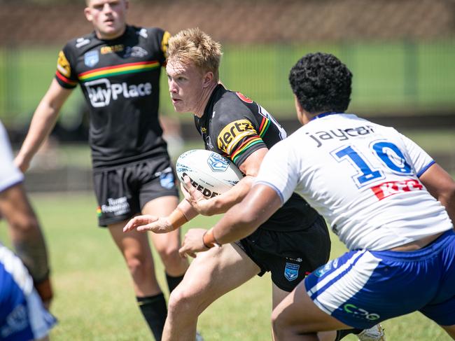 Cooper Hale tries to avoid David Leota. Picture: Julian Andrews