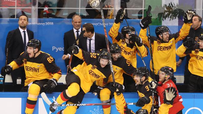 Germany reacts after defeating Canada 4-3 during the Men's Play-offs Semifinals.