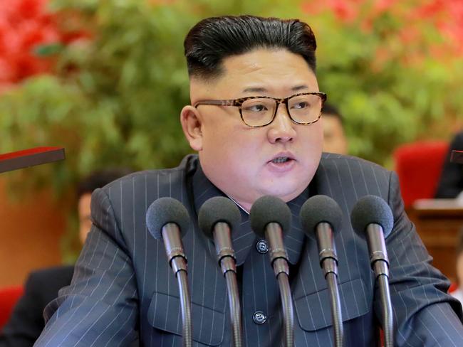 This recent picture released by North Korea's official Korean Central News Agency (KCNA) on August 29, 2016 shows North Korean leader Kim Jong-Un dellivering his speech during the 9th Congress of the Kim Il-Sung Socialist Youth League which held in Pyongyang on August 27 and 28, 2016. / AFP PHOTO / KCNA / KNS
