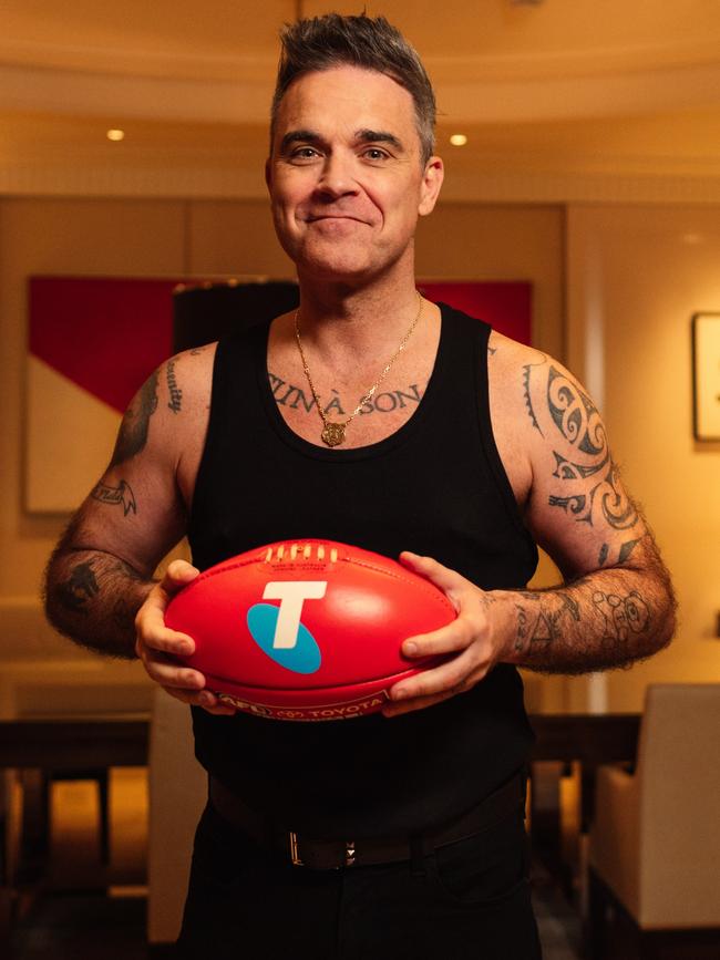 It was about 2am when Robbie Williams posed for a promo picture in his hotel room at Crown. Picture: Liam Pethick