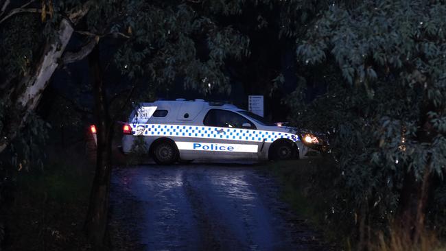 Police at the crime scene at Richardsons Bend Campground, near Barnawartha North. Picture: Simon Dallinger