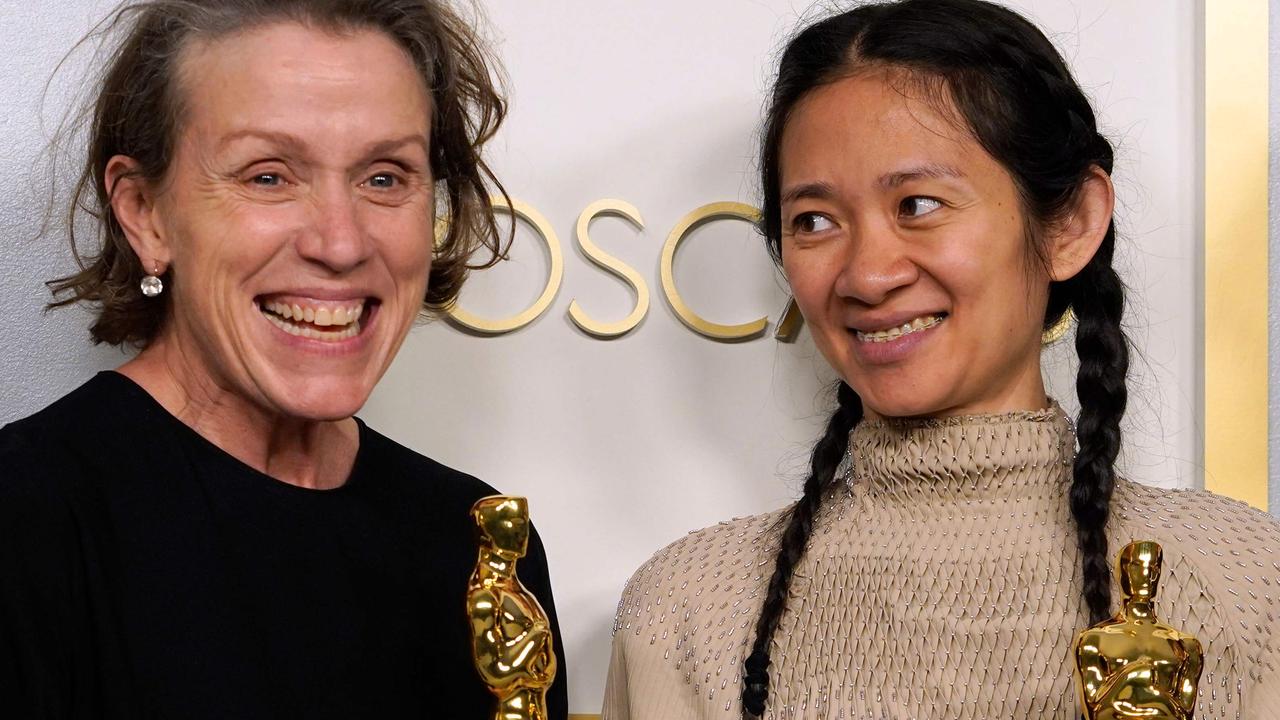 Nomadland’s Frances McDormand and Chloe Zhao with their shiny new Oscar statues. (Photo by Chris Pizzello / POOL / AFP)