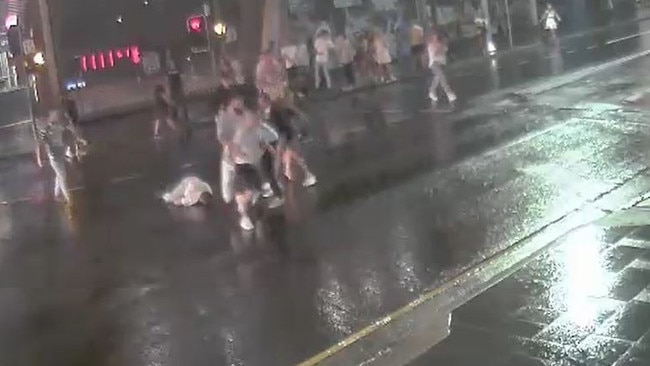 The footage shows one of the victims’ laying unconscious in the street.