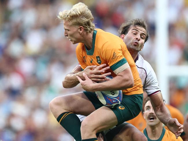 Australia's fly-half Carter Gordon (L) in action against Georgia. Picture: AFP