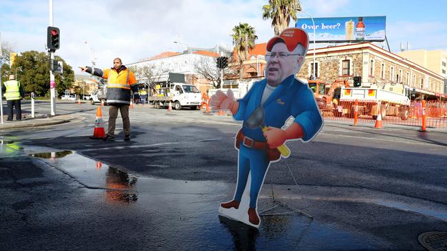 Cut out of Water Minister Ian Hunter at the scene.