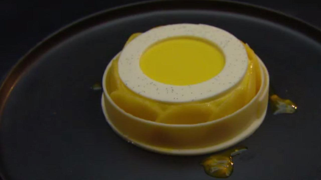 A delicate combination of coconut, passionfruit, salted caramel cream, mango mousse and vanilla panna cotta lay beneath. Picture: Channel 10