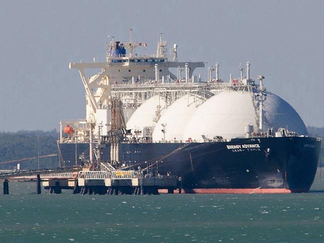 A liquefied natural gas (LNG) tanker operated by Energy Advance Co., a unit of Tokyo Gas Co., is moored at ConocoPhillips' LNG facilities in Darwin, Australia, on Wednesday, April 11, 2012. Darwin is in the express lane of Australia's two-speed economy -- a division the Reserve Bank of Australia used to separate resource-rich regions in the north that are powering growth and sucking in workers, from the tourism, manufacturing and retailer industries of the southeast that are teetering under a currency that has risen 65 percent in 3 1/2 years. Photographer: Sergio Dionisio/Bloomberg