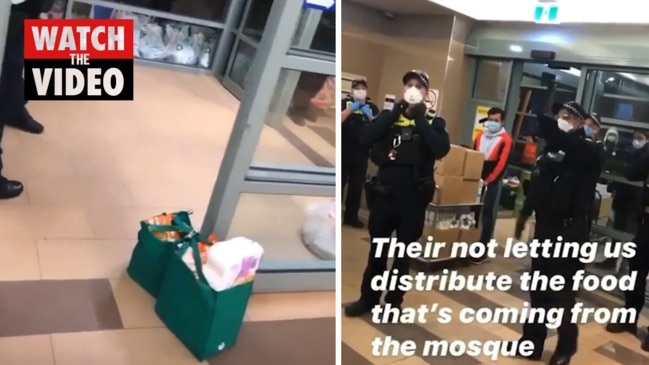 Tower residents clash with police over food donations