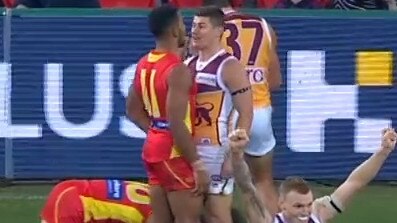 Dayne Zorko and Touk Miller clash.