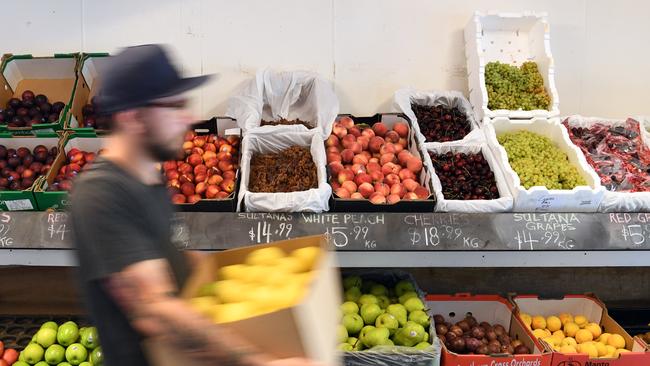 BJ at work in his greengrocer in Silvan. Photo: Julian Smith