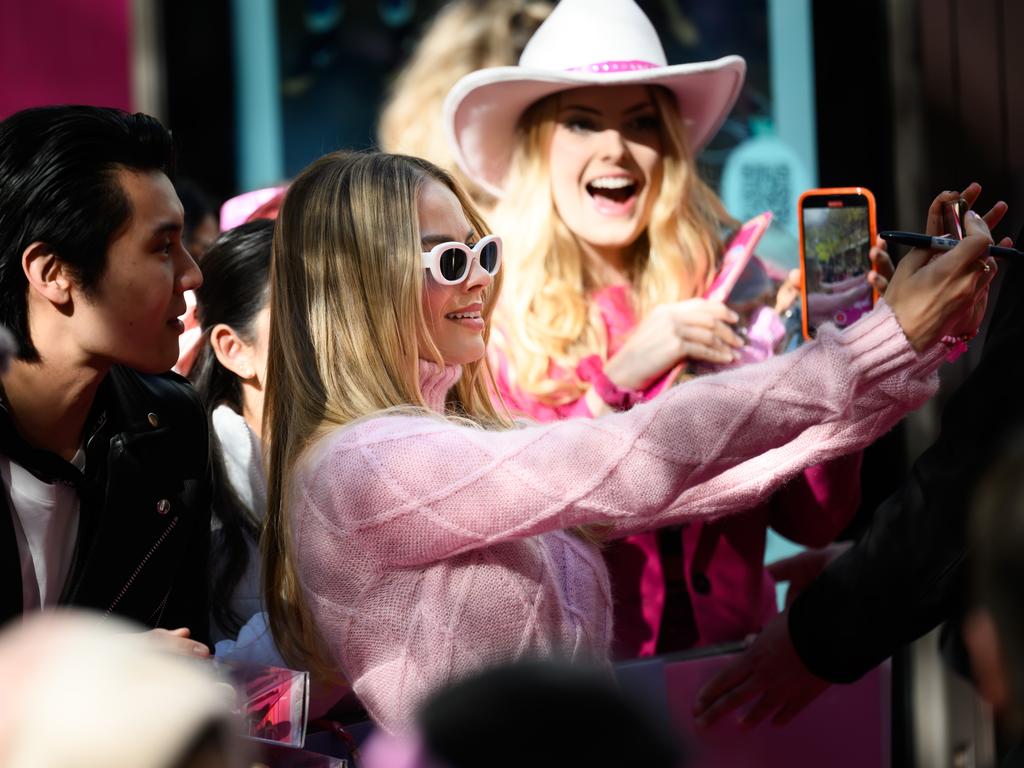 Robbie tooktime to talk and take selfies with fans. Picture: James Gourley/Getty Images