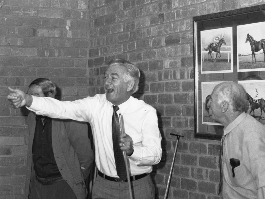 Prime Minister Bob Hawke hustled on the pool table with the blokes at Port Noarlunga's Perry Park Nursing Home, the first stop on his SA tour, 19 May 1989. The PM applauds a good shot in his game.