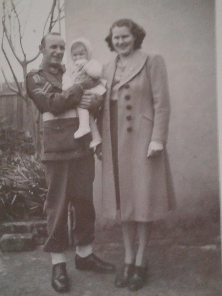 “Matthew Campbell Learmonth meeting daughter June (Bricknell), aged 13 months, for the first time at grandparents’ home, Carrington St, Concord. I didn't like the hat so I'm told.” Picture: Supplied by June Bricknell